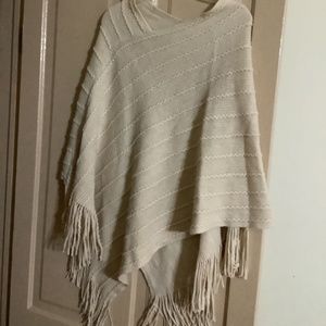 Off white pullover sweater poncho. Fringe trim. Size S/M